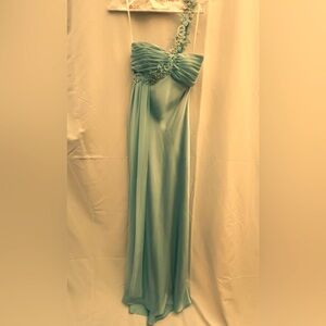 Beautiful powder blue one-shoulder formal with sequins. Size 4.